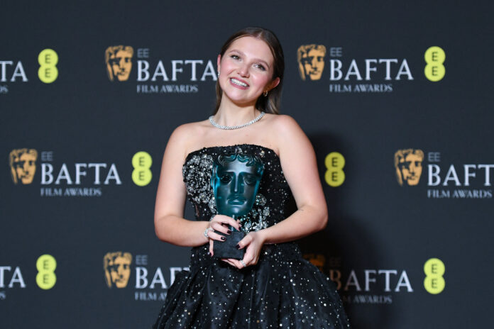 Mia Mckenna-Bruce at the 2024 EE BAFTA Film Awards. Photo by Marechal Aurore/ABACA/Shutterstock (14354514bp)